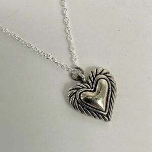 Silver tone heart pendant necklace